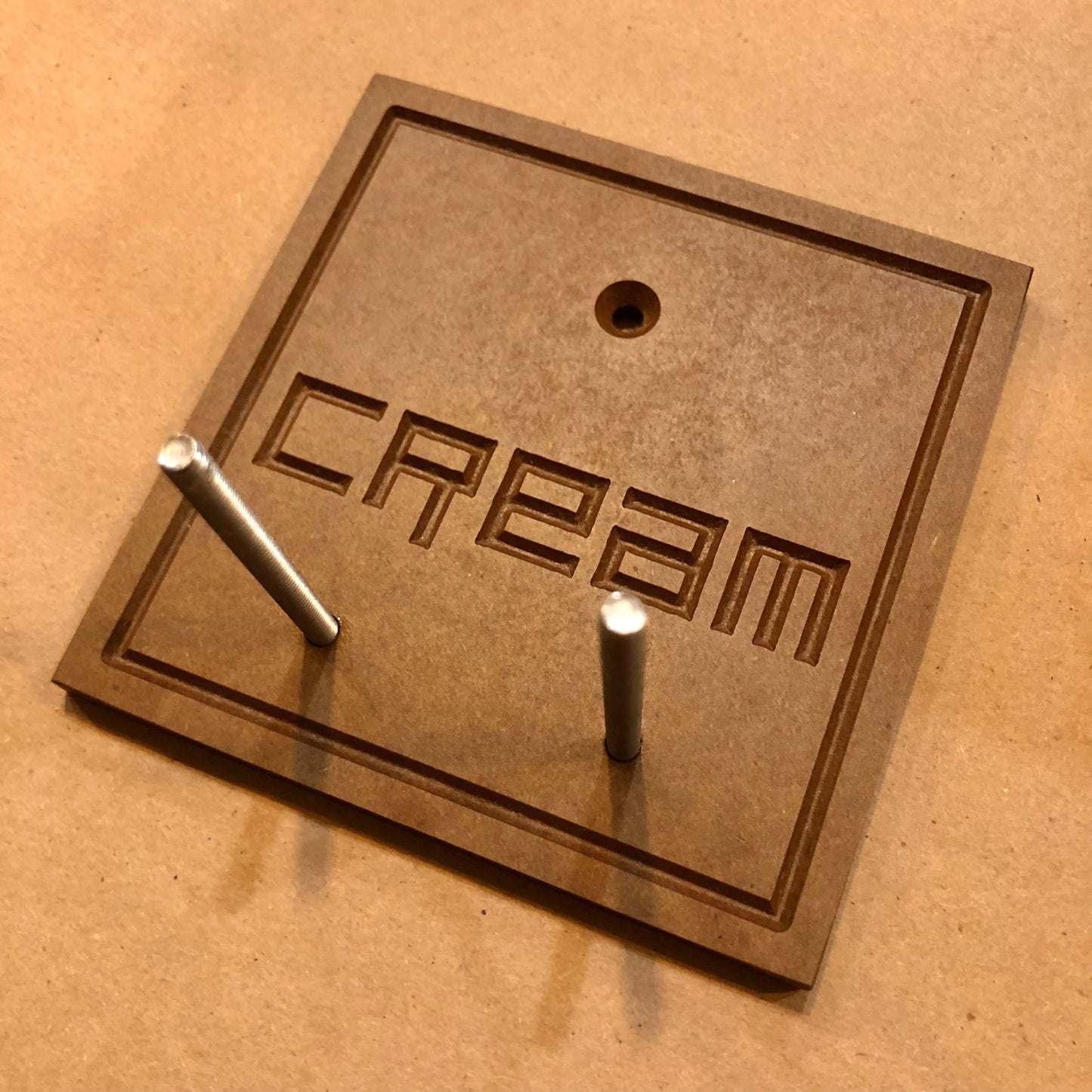 Floating Cream Skate Hanger - 1